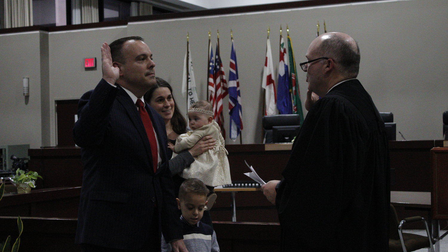 Councilman Dan Panico is sworn in by Hon. James Hudson