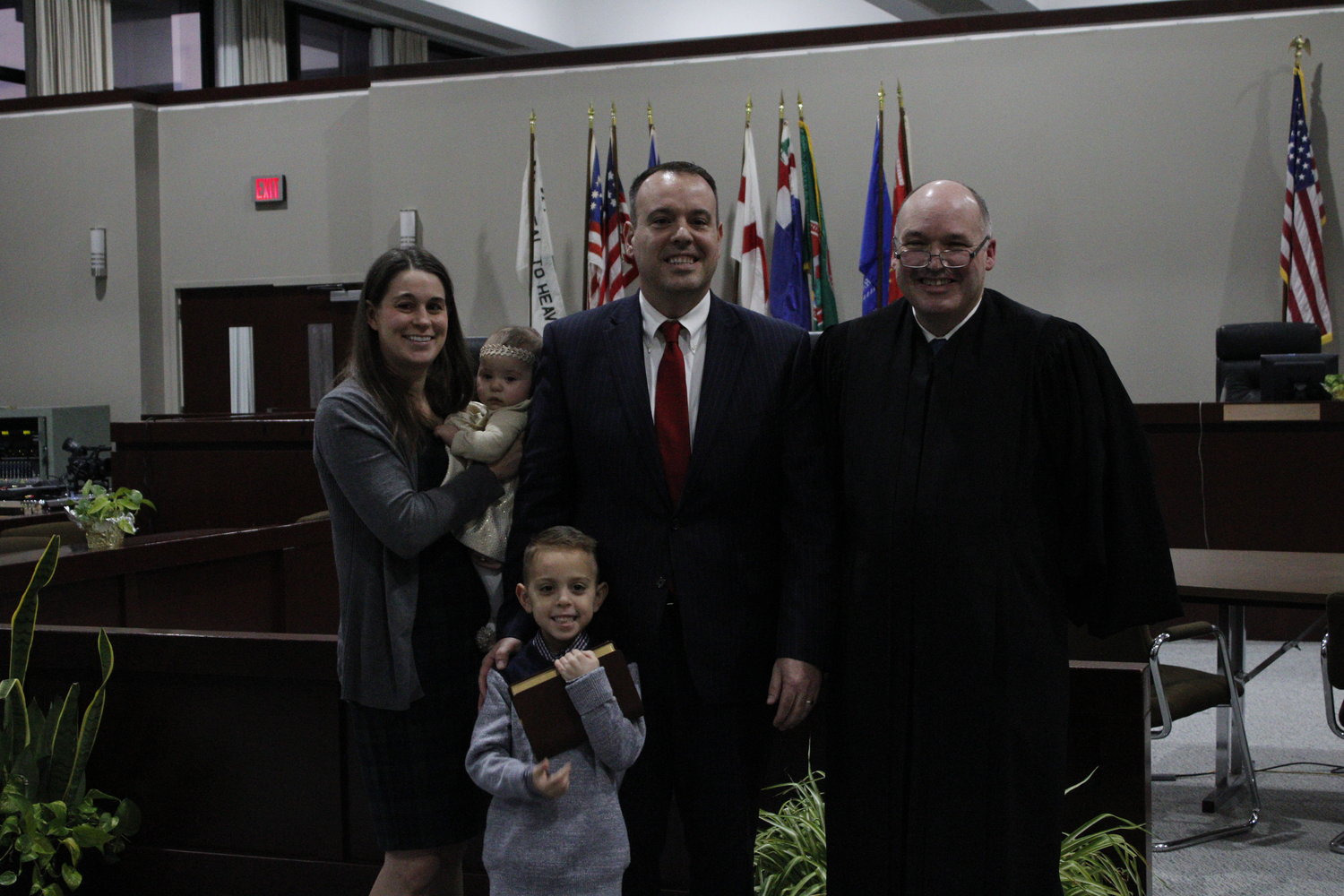 6th District Councilman Dan Panico with his family and Hon. James Hudson.