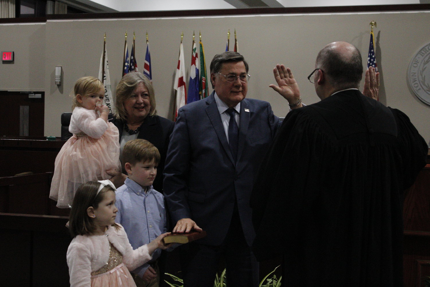Supervisor Ed Romaine is sworn in by Hon. James Hudson