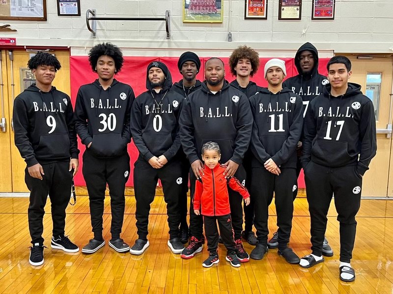 Rich Brown, founder of B.A.L.L. PREP, with his son Tyson Brown, joined by the current members of the program: (L-R) Aldene Forbes, Revaughn Johnson, Jathan Barnes, Noel Squire, Mark McClean, Jahron Barnes, Odaine Beckford, and Andrew Gonzalez.